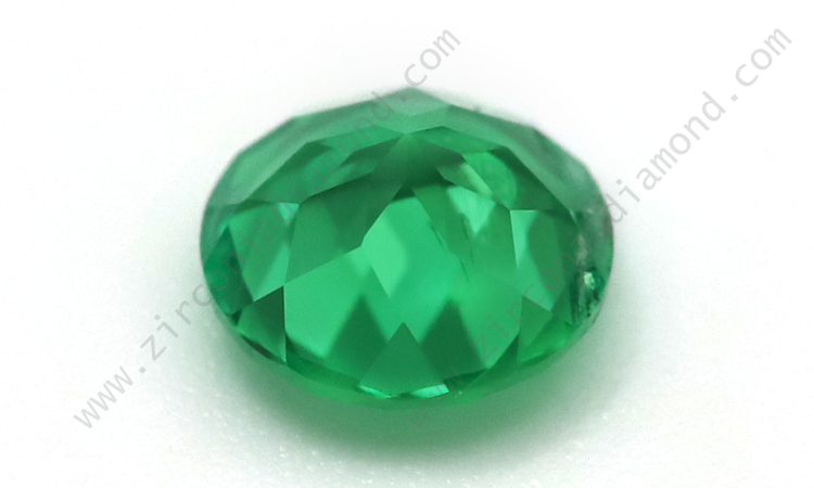 Zirmond round cut lab created synthetic emerald 2